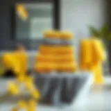 Elegant display of yellow and gray towel sets in a modern bathroom setting
