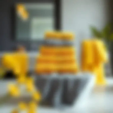 Elegant display of yellow and gray towel sets in a modern bathroom setting