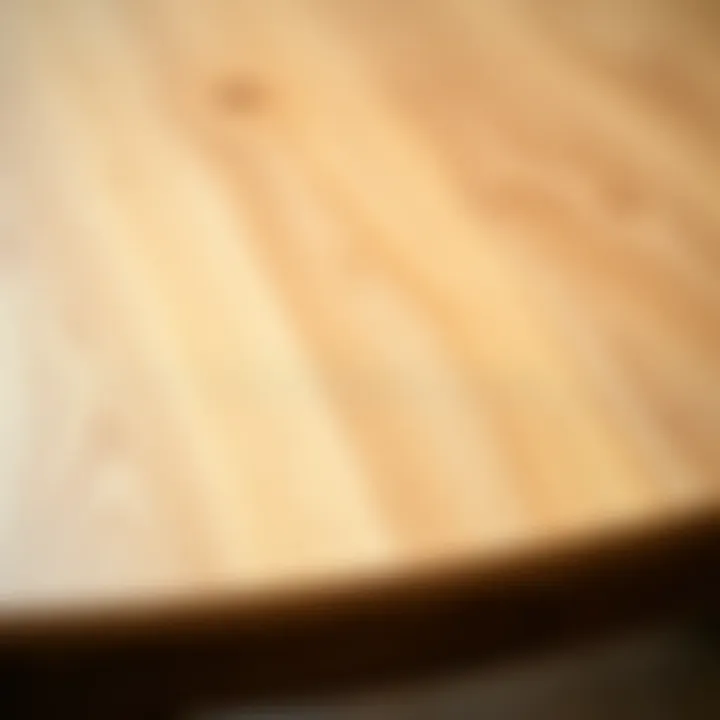 Close-up of the grain and texture of light wood dining table surface