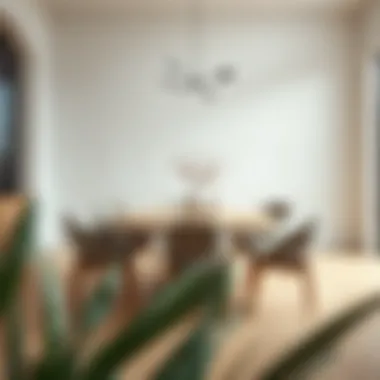 Elegant round dining table made of light wood in a modern dining room