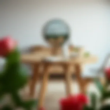 A beautifully styled dining table with decorative elements and light wood finish