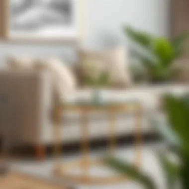 Elegant small gold glass side table in a modern living room setting