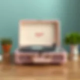 Elegant light pink record player showcasing vintage design