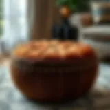 Luxurious round brown ottoman with intricate stitching