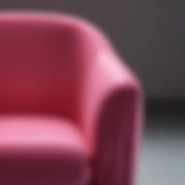 Close-up of a neon pink chair showcasing its sleek design and texture